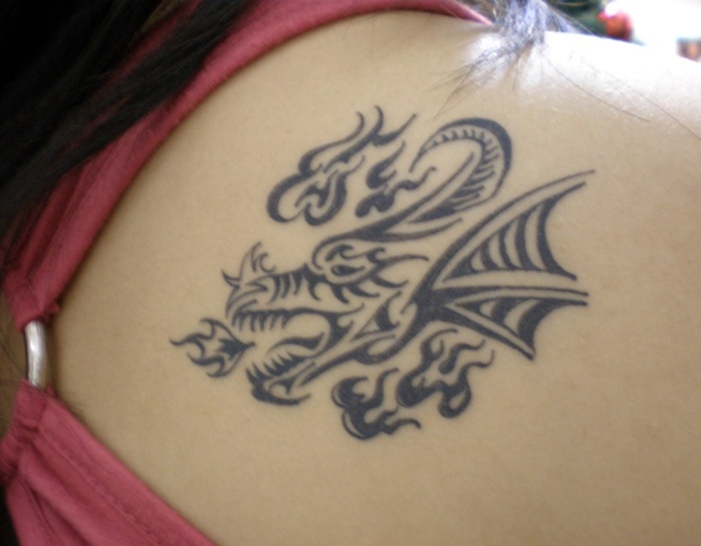 Shoulder tattoo tribal dragon Tribal dragon