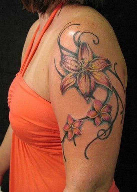 Amazing Lily Tattoo On Left Shoulder