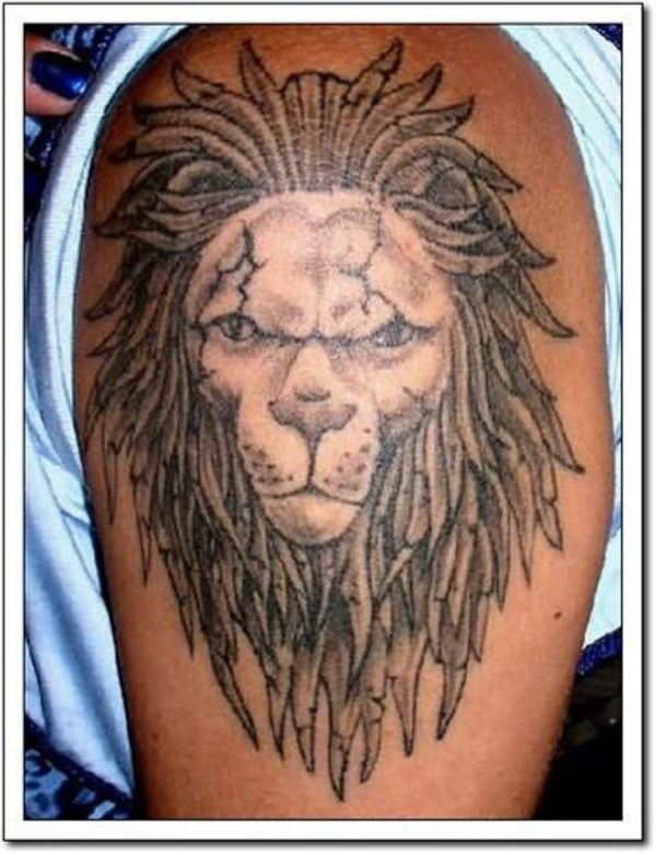 Amazing Lion Face Tattoo On Left Shoulder