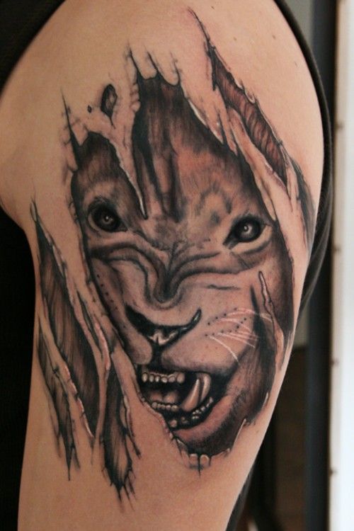 Amazing Lion Face Tattoo