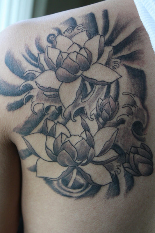 Amazing Lotus Flower Tattoo