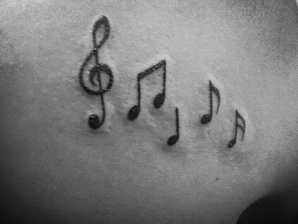 Amazing Music Note Tattoo