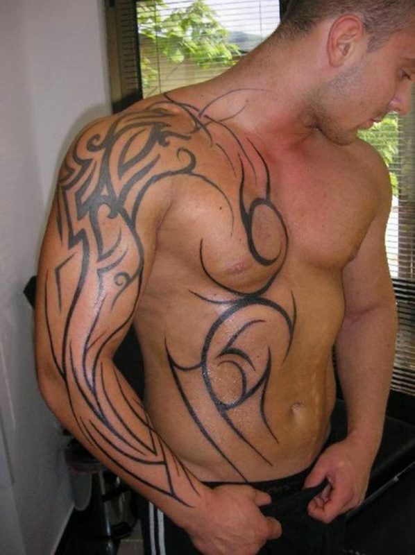 Amazing Tribal Shoulder Tattoo On Shoulder