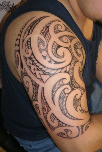 Amazing Tribal Shoulder Tattoo