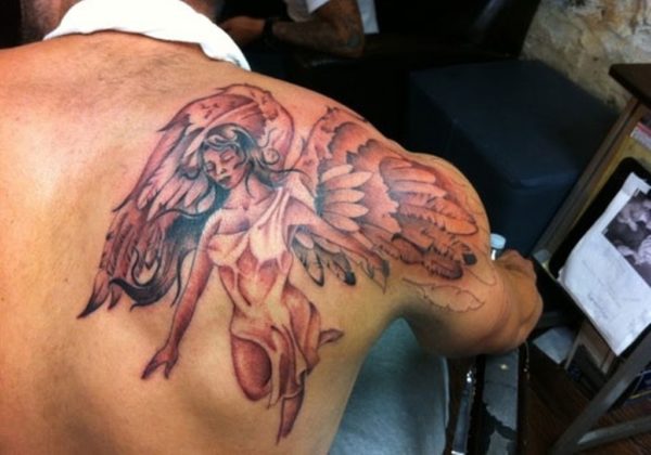 Angel With Large Wings Tattoo