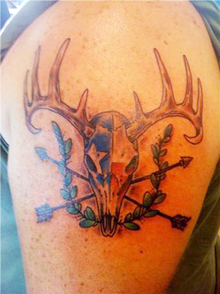 Animal Skull With Arrow Tattoo