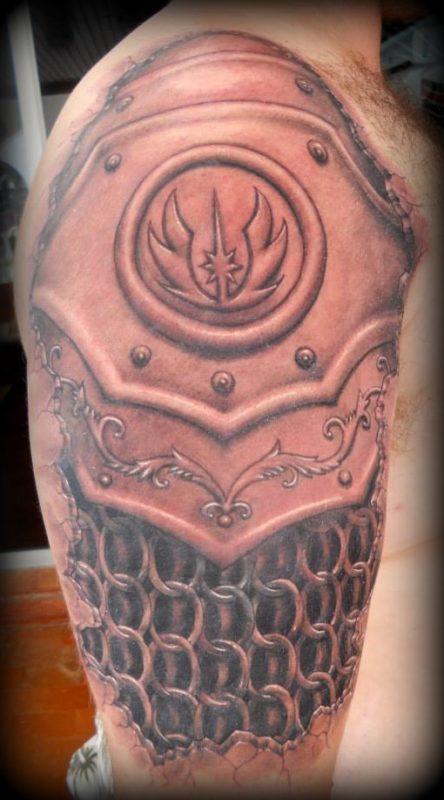 Armour Shoulder Tattoo On Right Shoulder