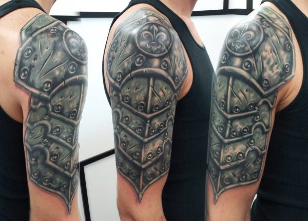 Armour Tattoo On Right Shoulder