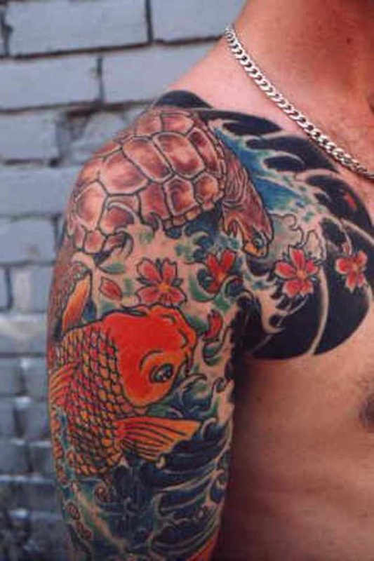 Attractive Fish Shoulder Tattoo