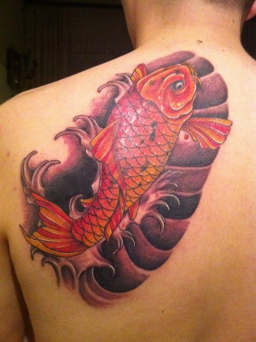 Attractive Red Fish Tattoo On Shoulder Back