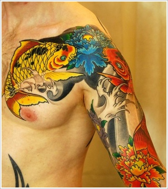 Attractive Yellow Fish Tattoo On Right Shoulder