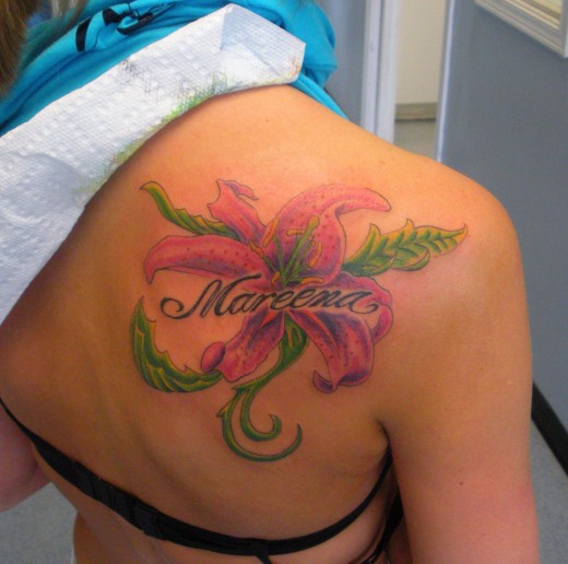 Awesome Lily Tattoo On Back Shoulder