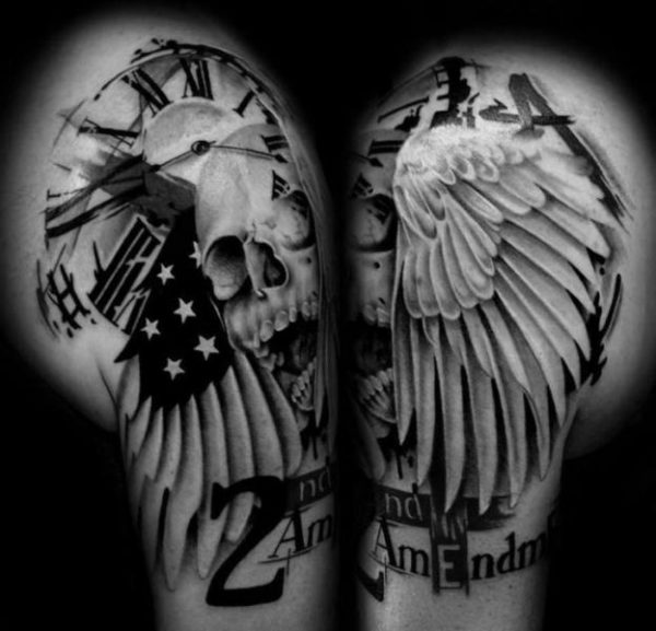 Black And White Skull Wings Tattoo