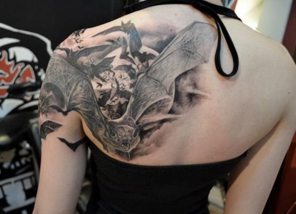 Bat Flying In Clouds Shoulder Tattoo