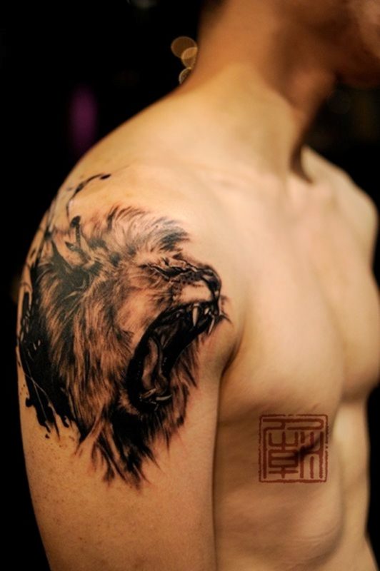 Beautiful Black Lion Shoulder Tattoo
