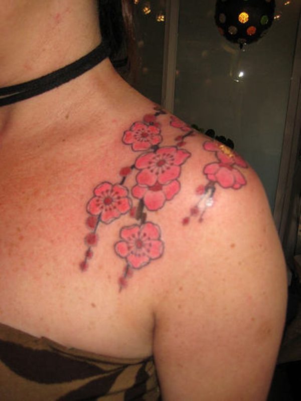 Beautiful Pink Flowers Tattoo Design On Shoulder