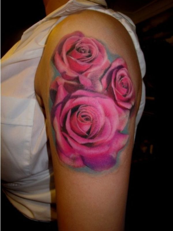 Beautiful Pink Flowers Tattoo On Left Shoulder