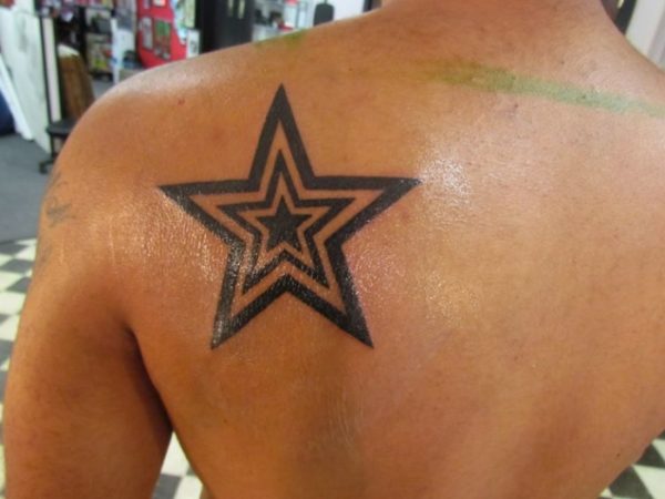 Big Star Tattoo On Shoulder Back