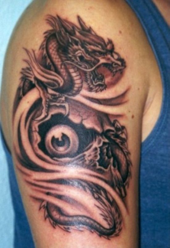  Black And Grey Dragon Shoulder Tattoo