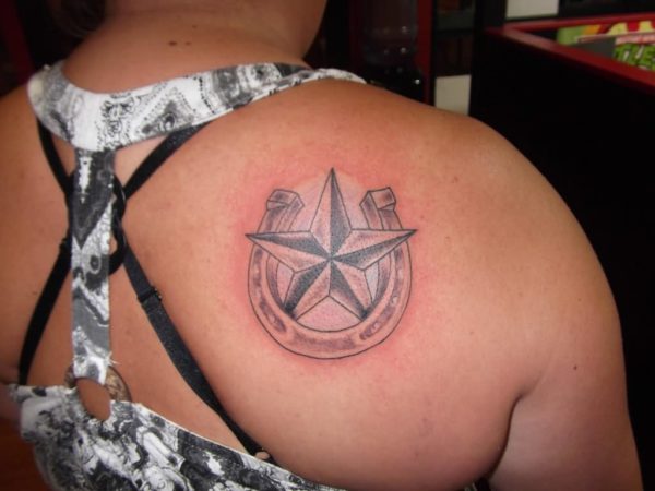 Black And Grey Nautical Star In Horseshoe Tattoo