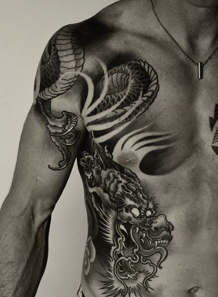 Black And White Dragon Shoulder Tattoo