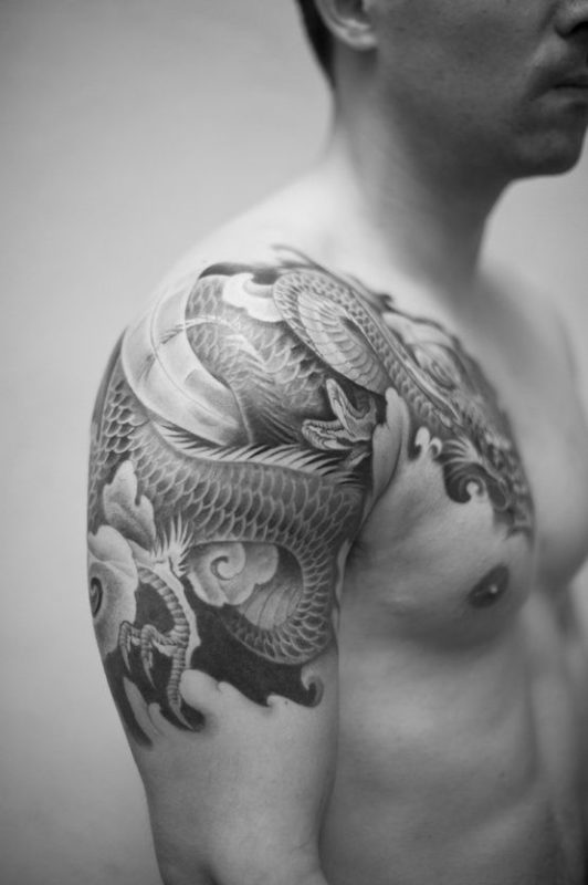 Black And White Dragon Tattoo On Right Shoulder