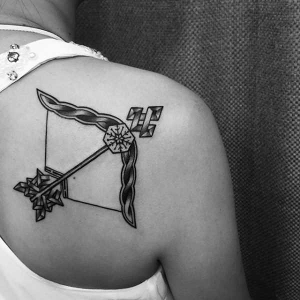 Black Bow And Arrow Tattoo