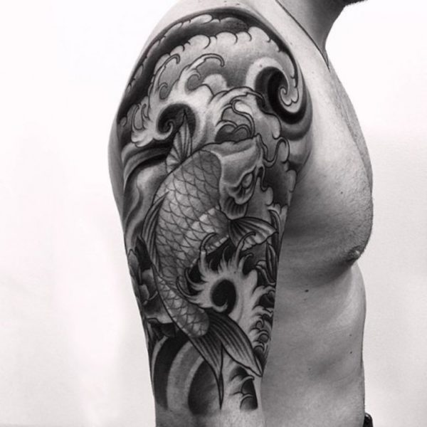 Black Fish Tattoo On Right Shoulder