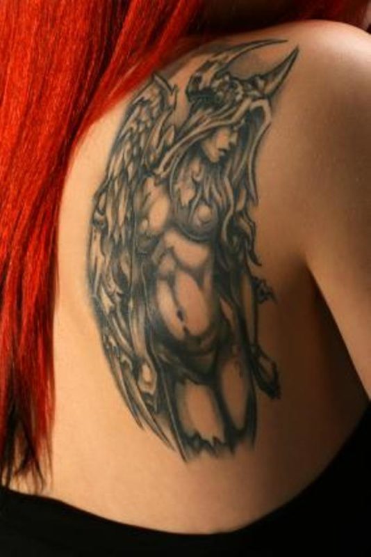 Black Lady Tattoo On Shoulder