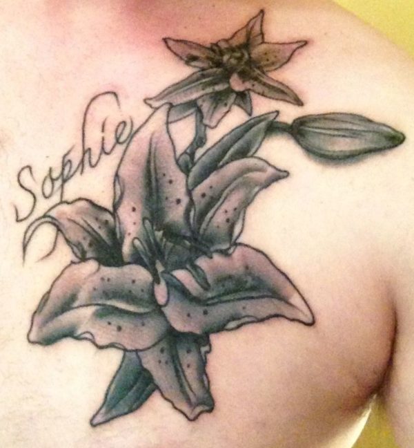 Black Lily Tattoo On Front Shoulder