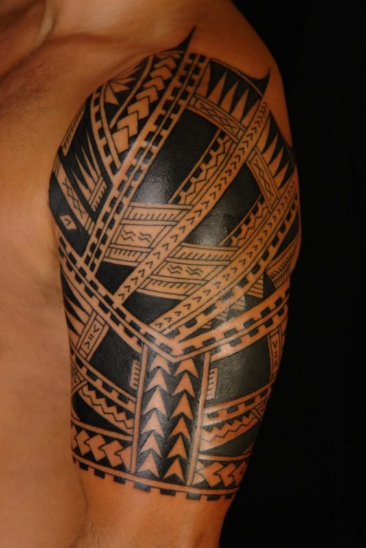 Black Maori Tattoo Design On Left Shoulder