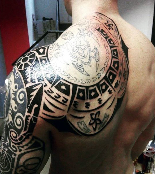Black Maori Tattoo On Left Shoulder