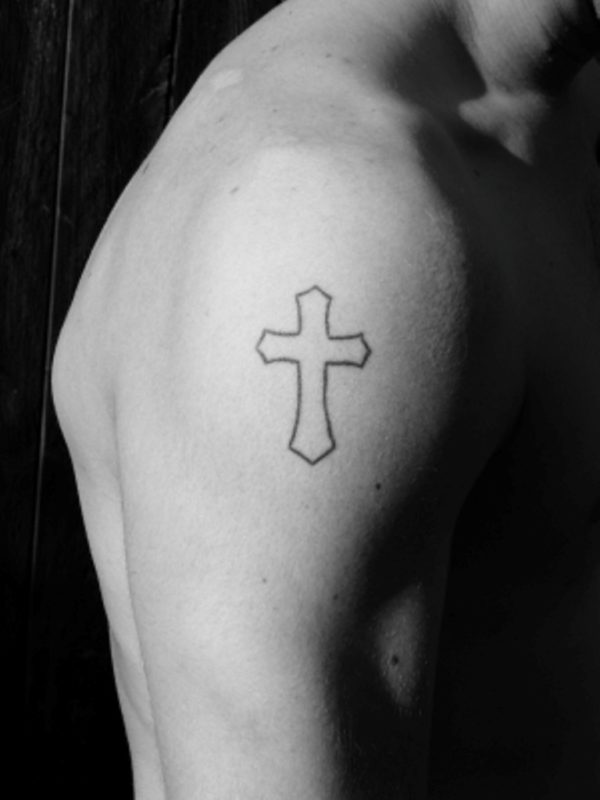 Black Outline Cross Tattoo On Shoulder