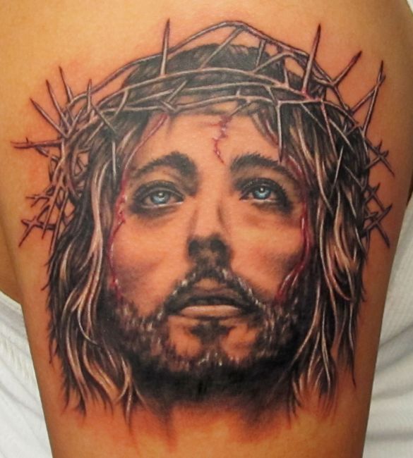 Black Religious Tattoo On Shoulder
