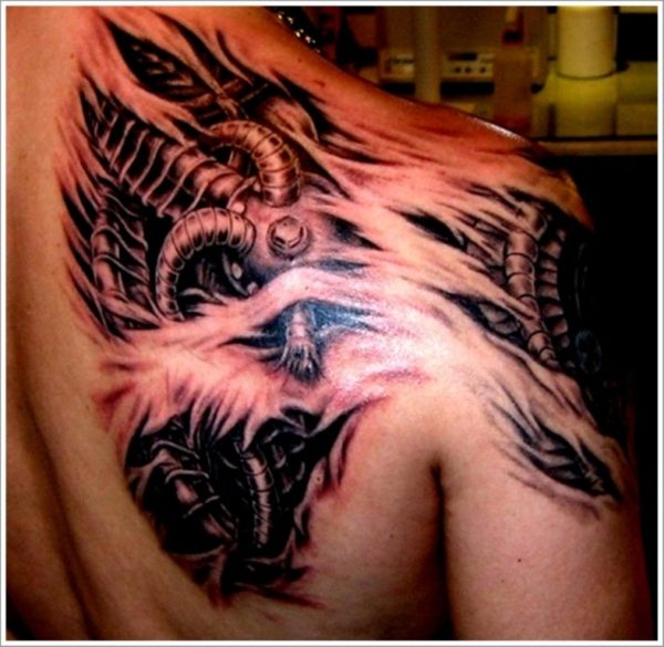 Black Rip Tattoo On Shoulder