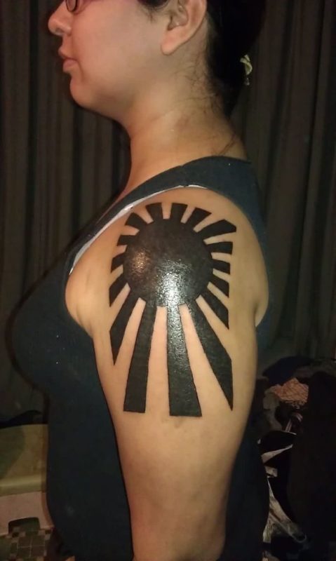 Black Rising Sun Tattoo