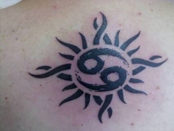 Black Sun Shoulder Tattoo