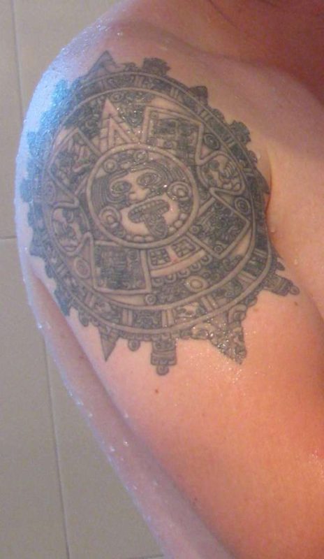 Black Sun Tattoo On Shoulder