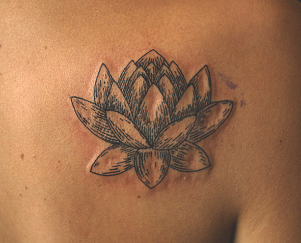 Blade Style Lotus On Shoulder