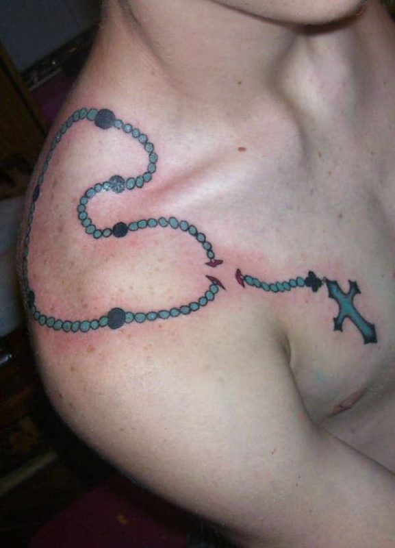 Blue Rosary On Shoulder