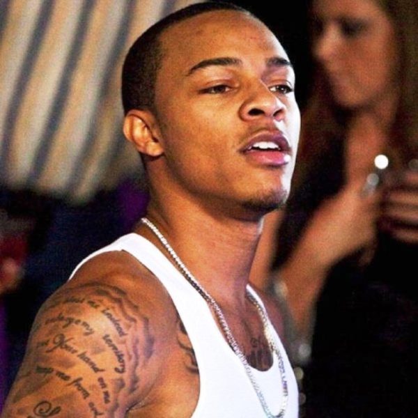 Bow Wow Shoulder Lettering Tattoo