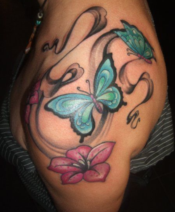 Colored Butterfly Tattoo On Left shoulder