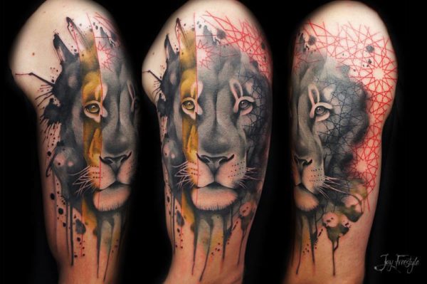 Colored Lion Tattoo On Left Shoulder