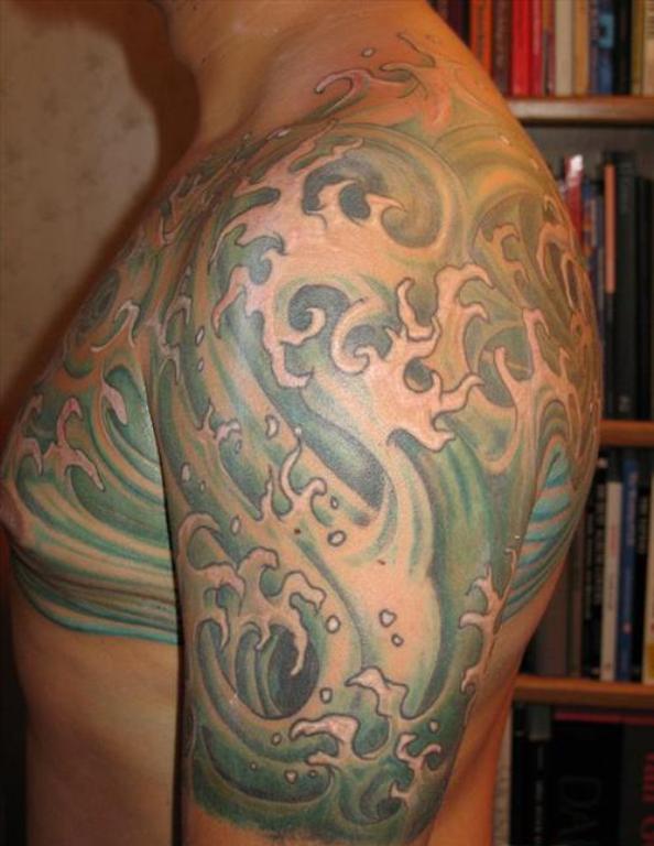 Colorful Tattoo On Left Shoulder