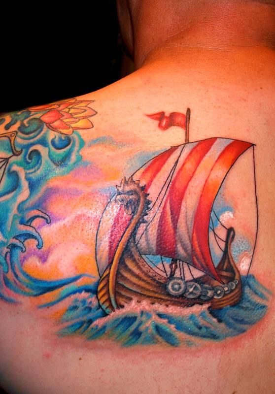 Colorful Viking-Ship Tattoo On Left Shoulder