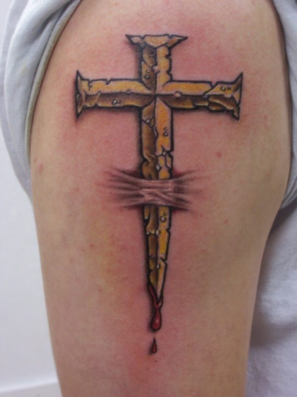 Cross Ripped Shoulder Tattoo