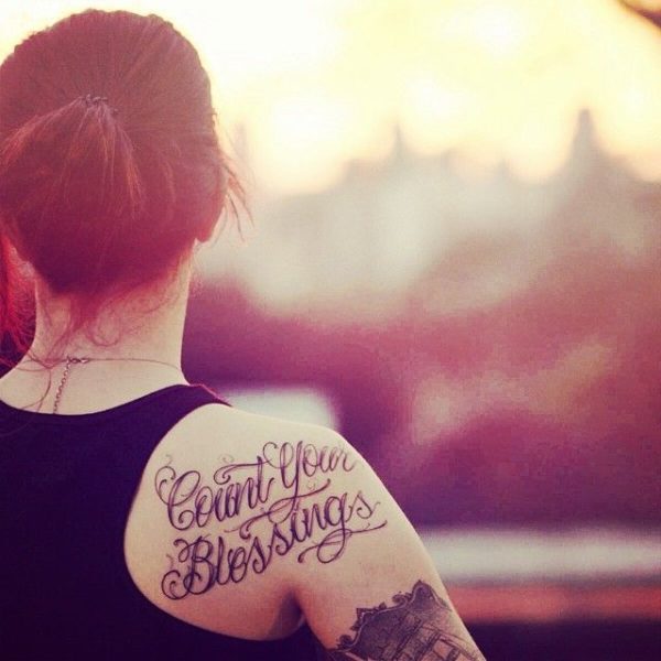 Cute Lettering Tattoo On Girl Shoulder