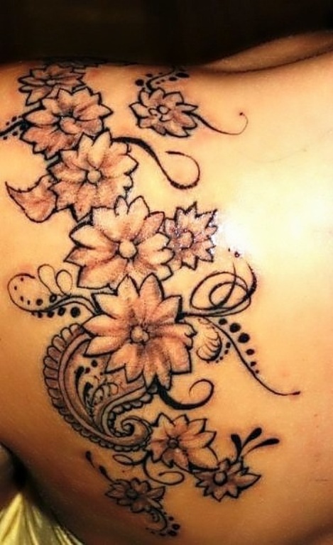 Designer Tattoo On Left Back