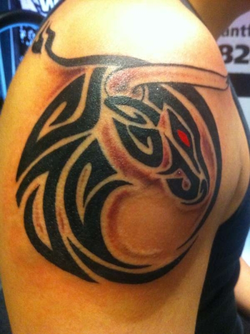 Designer Tribal Shoulder Tattoo For Men