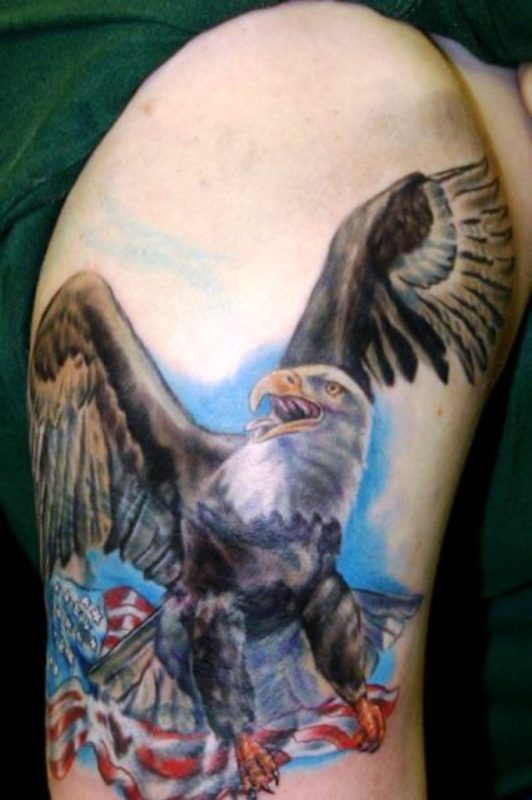 Eagle Holding American Flag Tattoo